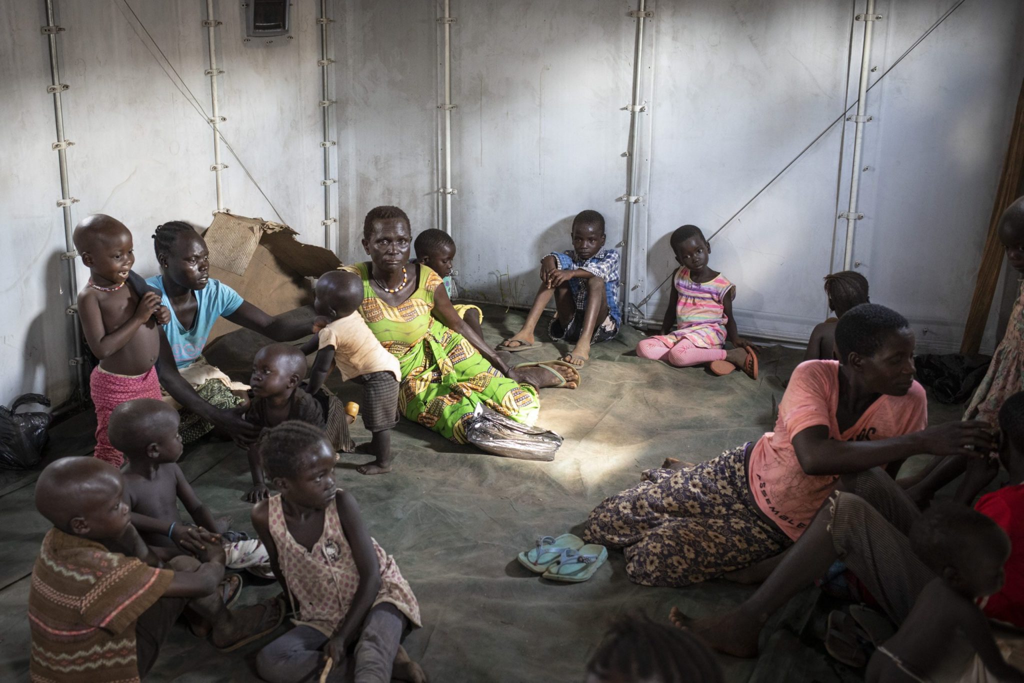 Democratic Republic of Congo. Newly arrived South Sudanese refugees rest in a temporary tent at the refugee settlement in Biringi