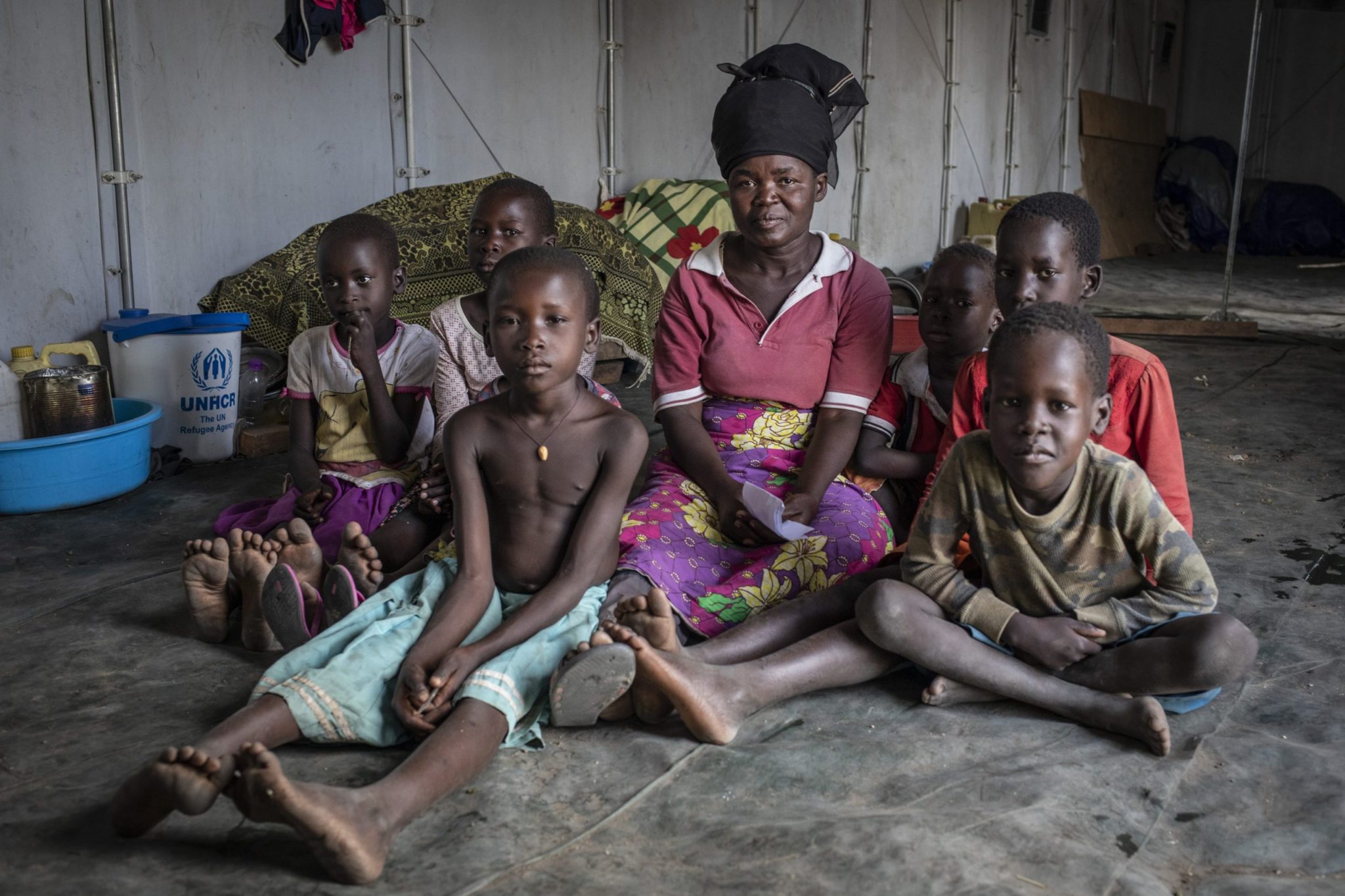 Democratic Republic of Congo. South Sudanese refugee Ato Grace, 38, poses with six of her eight children