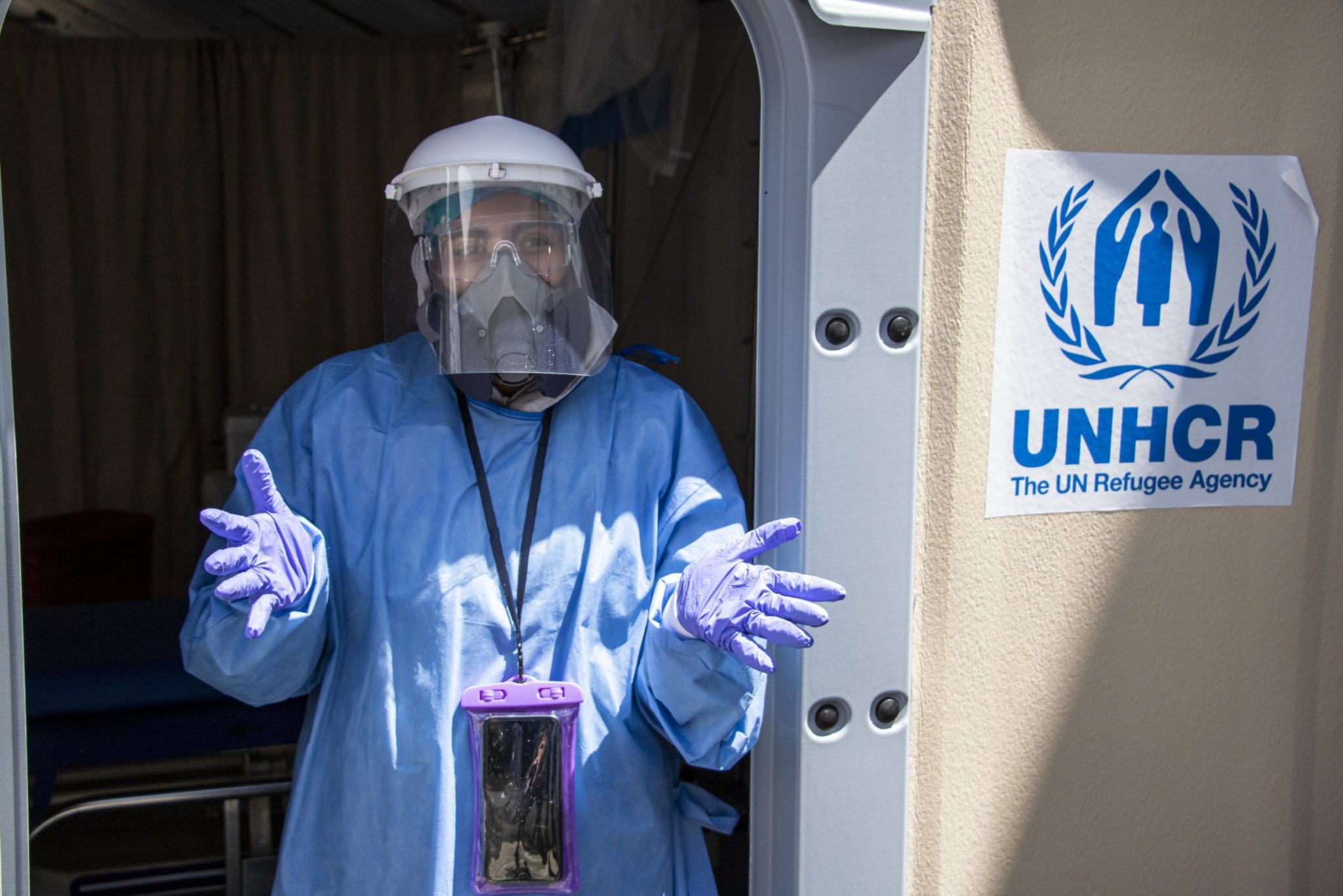 Ecuador. Local doctor treats patients in Refugee Housing Unit donated by UNHCR