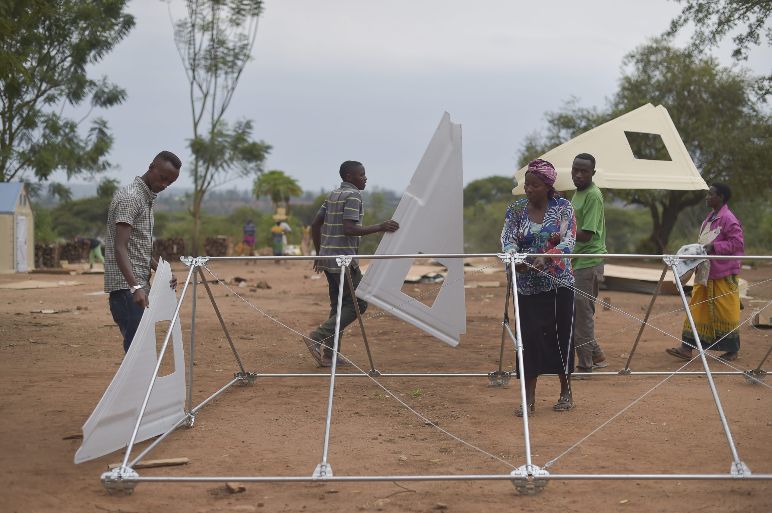 Rwanda. Workers ready transit centre for UNHCR's evacuees from Libya